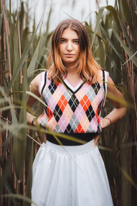 Argyle knit vest in the reeds, soft overcast light