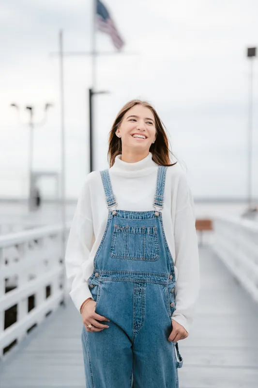 Denim overalls on the pier, overcast sky