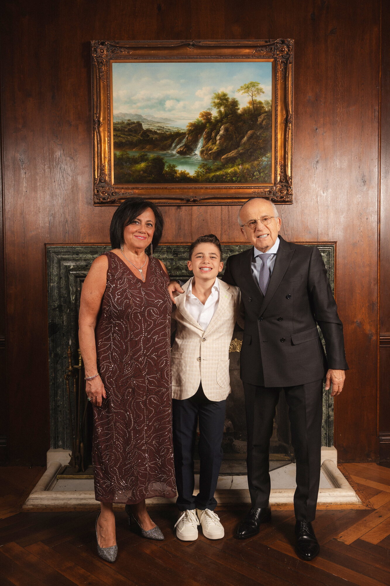 Family posing together at a bar mitzvah celebration